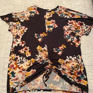 Cold shoulder with cinched tie back floral top